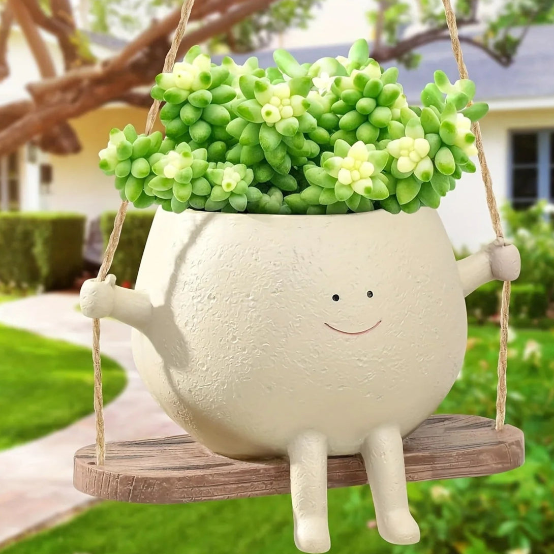 Pot de fleurs en résine : ce pot de fleurs suspendu avec balançoire est un objet de décoration - CHiCLiKi