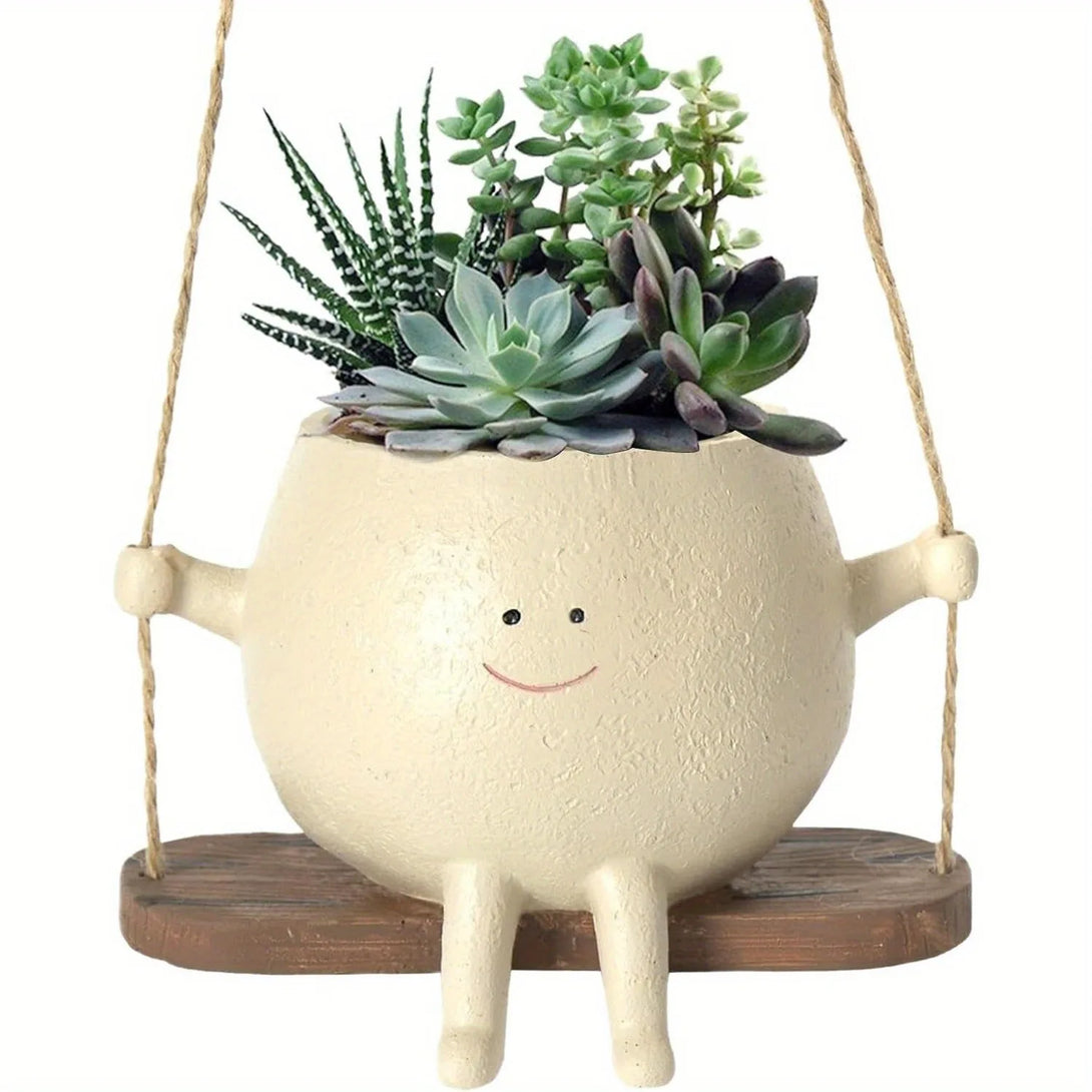 Pot de fleurs en résine : ce pot de fleurs suspendu avec balançoire est un objet de décoration - CHiCLiKi