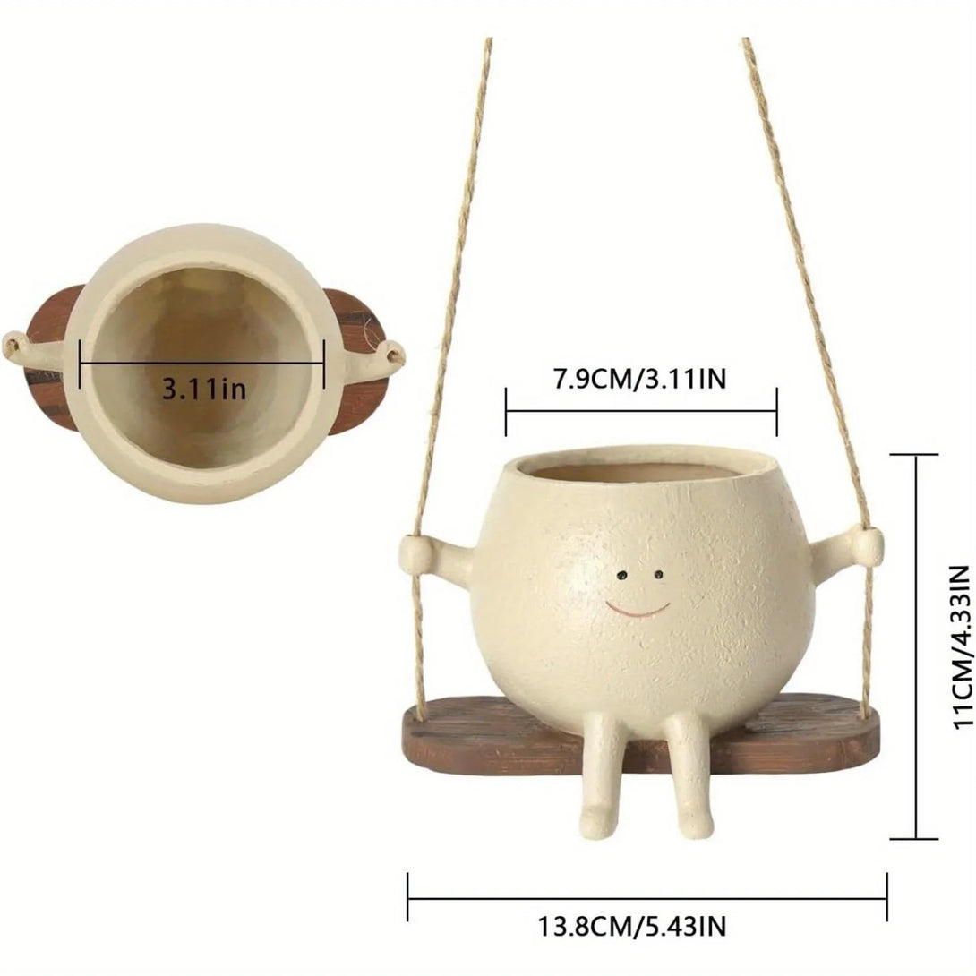 Pot de fleurs en résine : ce pot de fleurs suspendu avec balançoire est un objet de décoration - CHiCLiKi