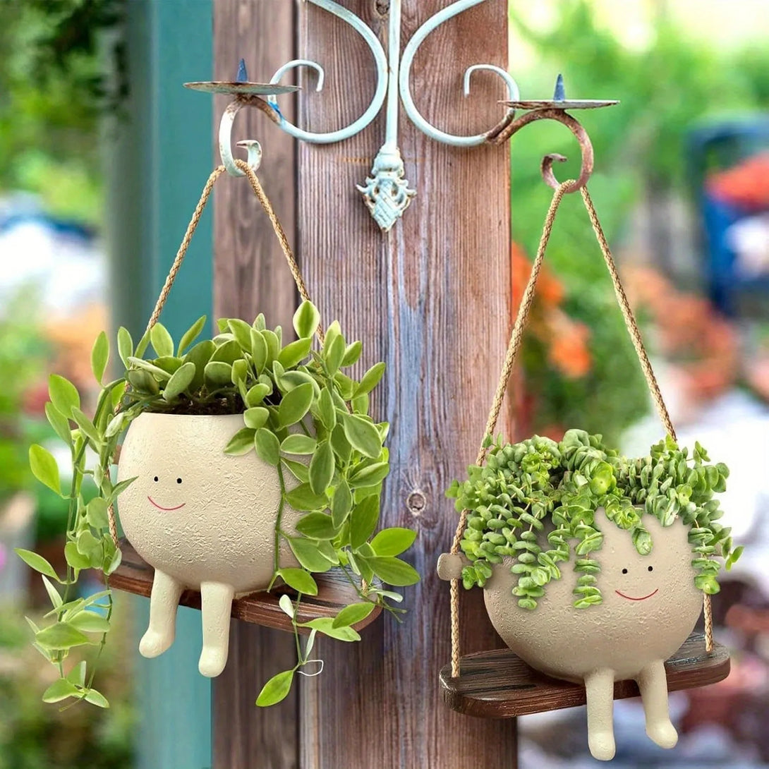 Pot de fleurs en résine : ce pot de fleurs suspendu avec balançoire est un objet de décoration - CHiCLiKi